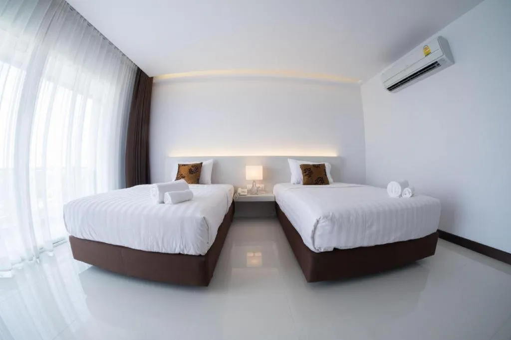 Bed in Chaisaeng Villa