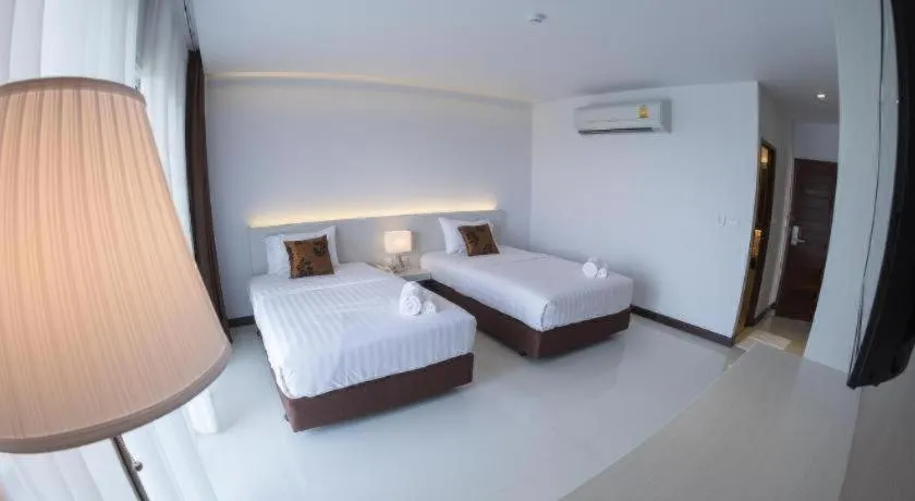 Bed in Chaisaeng Villa