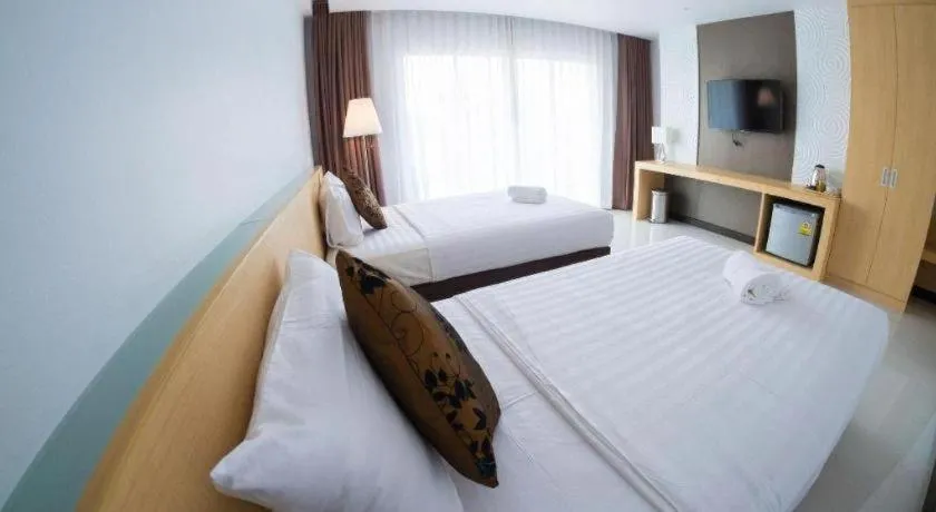 Bed in Chaisaeng Villa