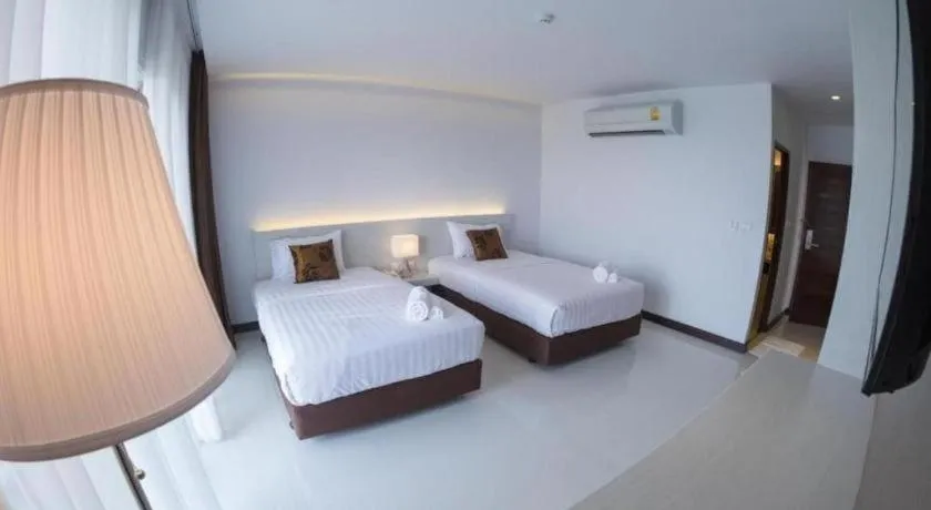 Bed in Chaisaeng Villa