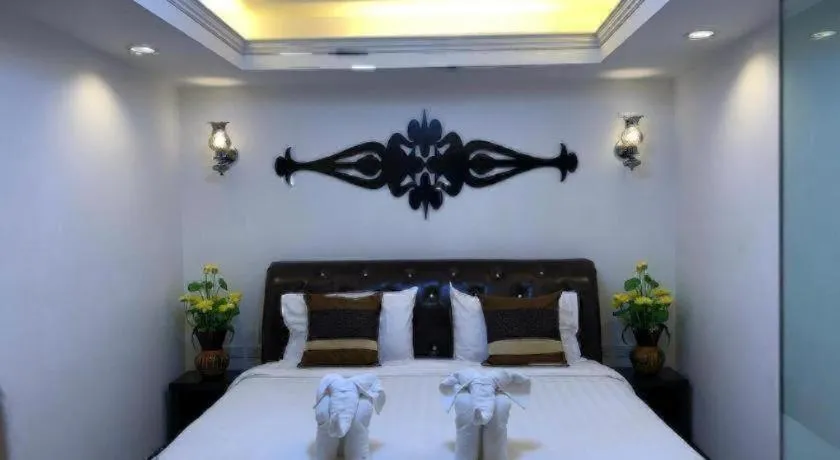 Bed in Samranchaykhong Hotel