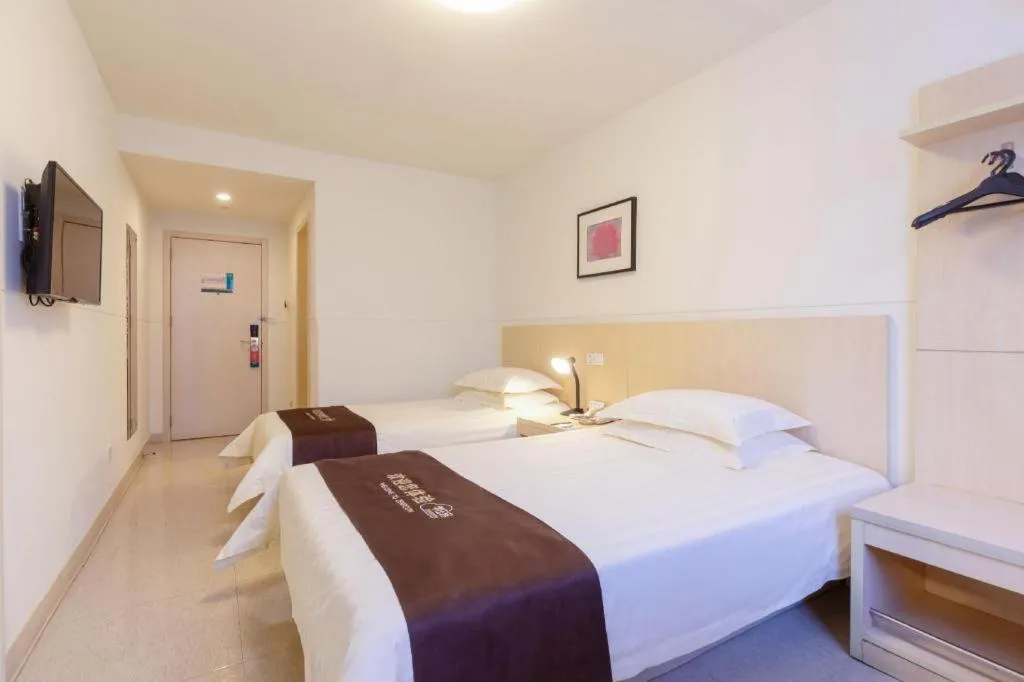 Bed in Jinjiang Inn Guangzhou Liwan Caihongqiao Metro Station