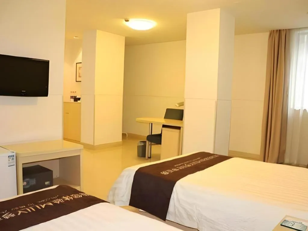 Bed in Jinjiang Inn Guangzhou Liwan Caihongqiao Metro Station