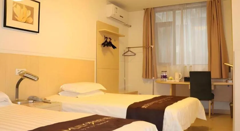 Bed in Jinjiang Inn Guangzhou Liwan Caihongqiao Metro Station