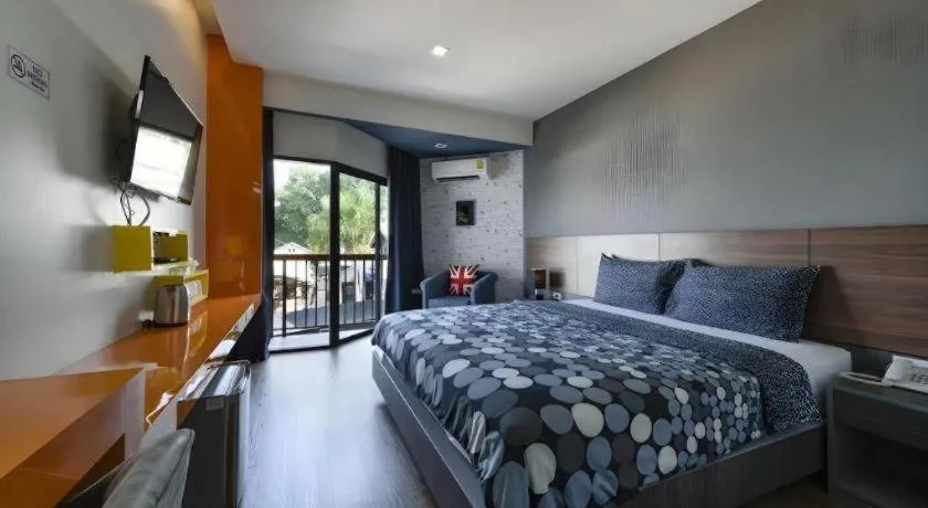 Bed in The Loft Seaside Sriracha Hotel