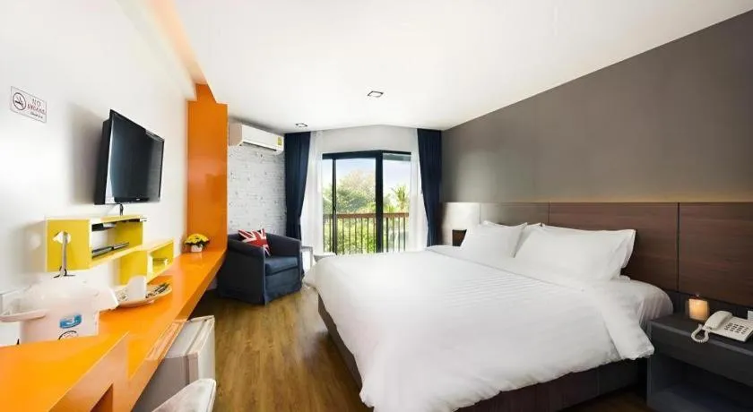 Bed in The Loft Seaside Sriracha Hotel