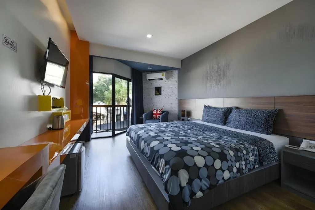 Bed in The Loft Seaside Sriracha Hotel