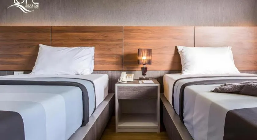 Bed in The Loft Seaside Sriracha Hotel