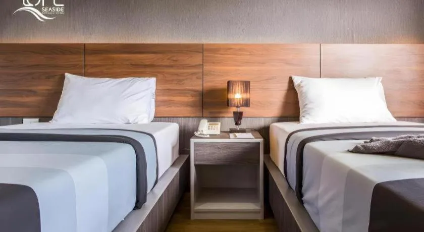 Bed in The Loft Seaside Sriracha Hotel