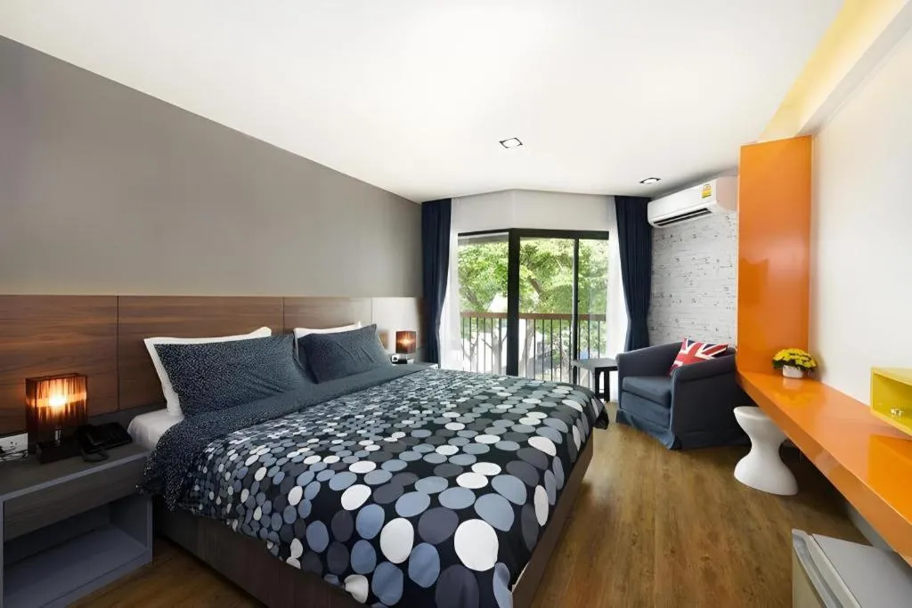 Bed in The Loft Seaside Sriracha Hotel