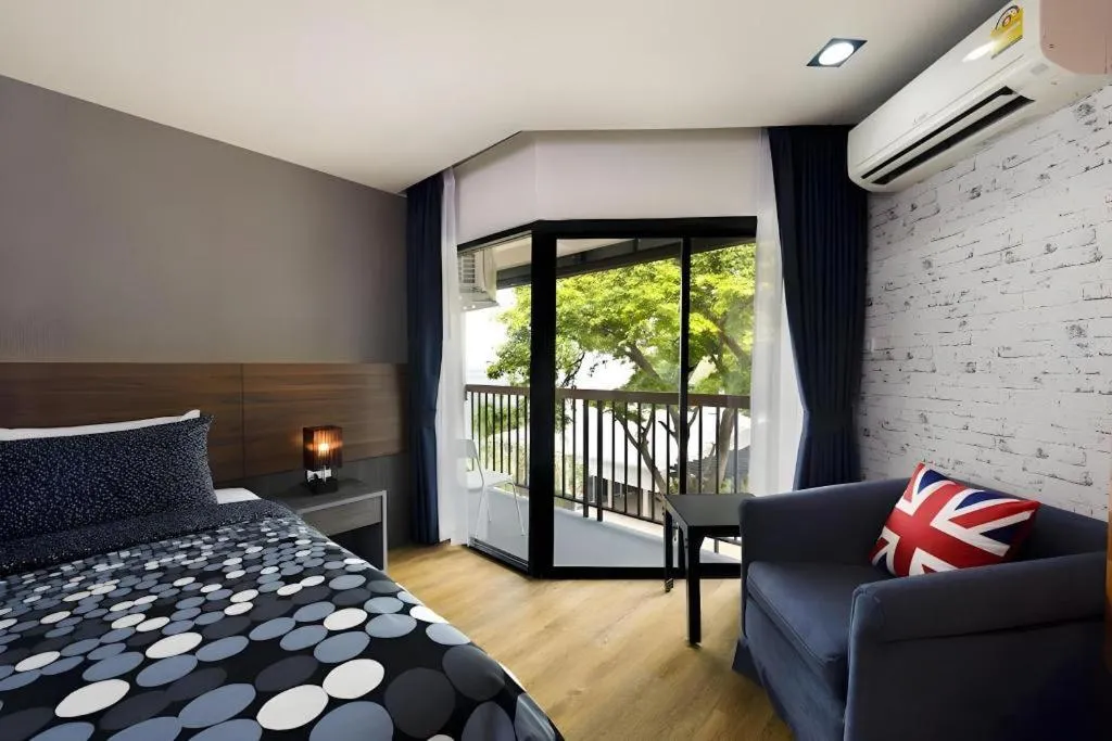 Bed in The Loft Seaside Sriracha Hotel