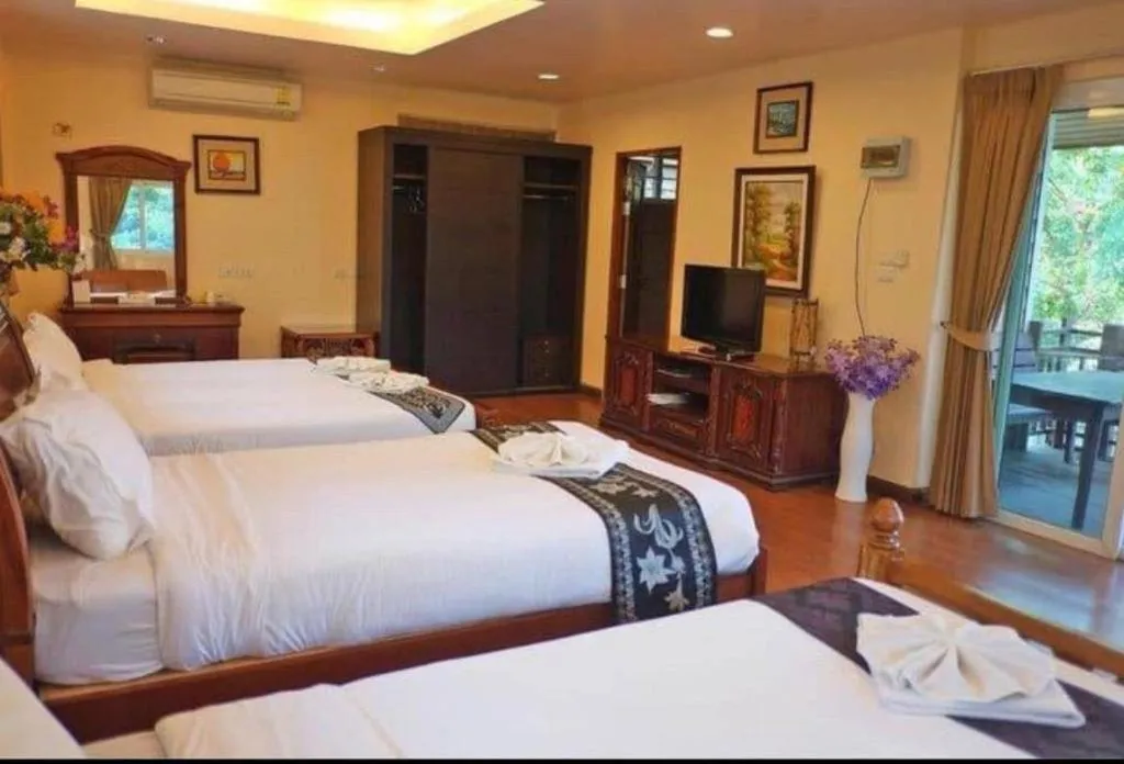 Bed in Khaoyai Kirithantip Resort