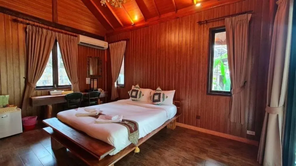 Bed in Khaoyai Kirithantip Resort