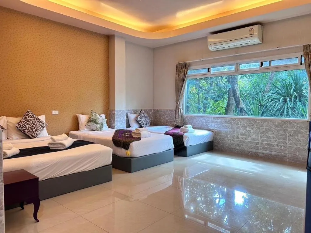 Bed in Khaoyai Kirithantip Resort