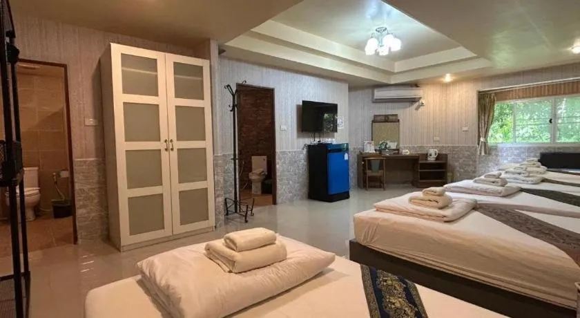 Bed in Khaoyai Kirithantip Resort