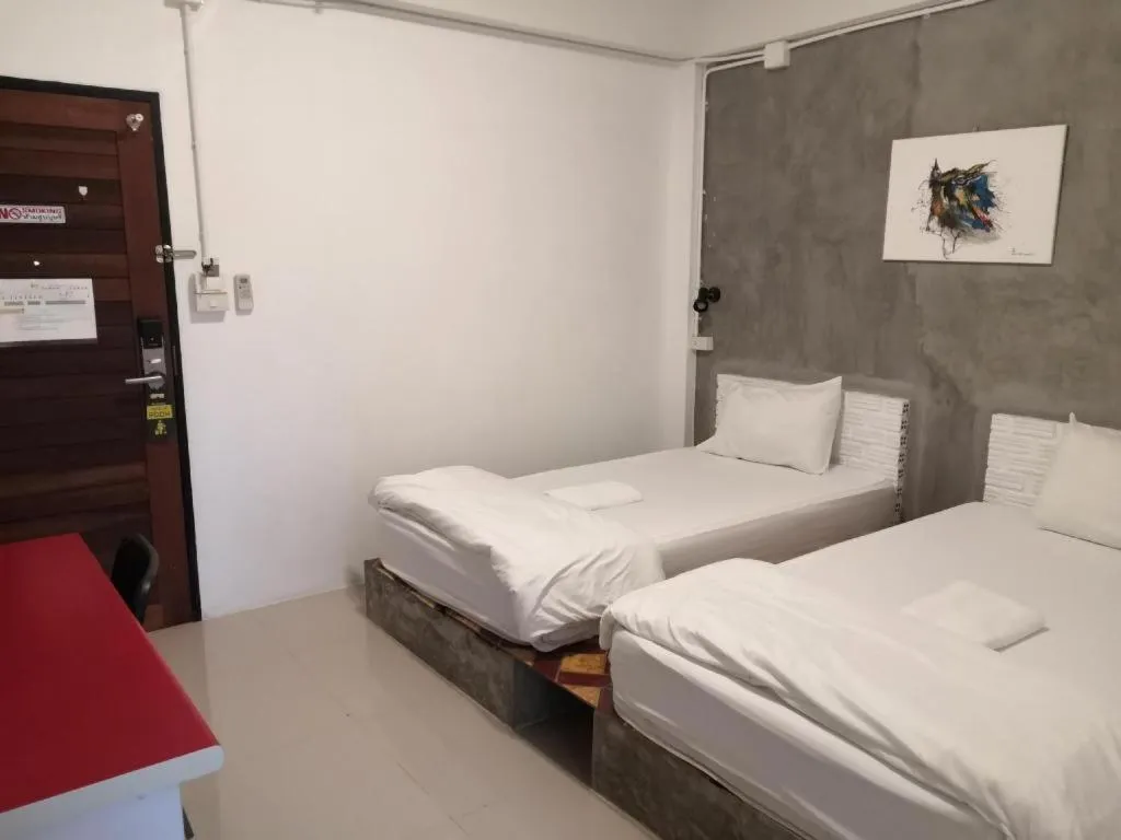 Bed in The Lighthouse Resort at Chanthaburi