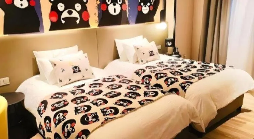 Bed in Magnotel Hotel Shanghai Jinjiang Park Branch