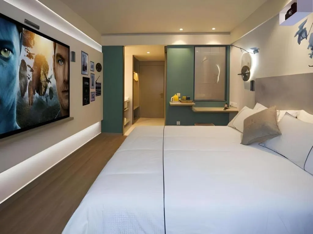 Bed in Magnotel Hotel Shanghai Jinjiang Park Branch