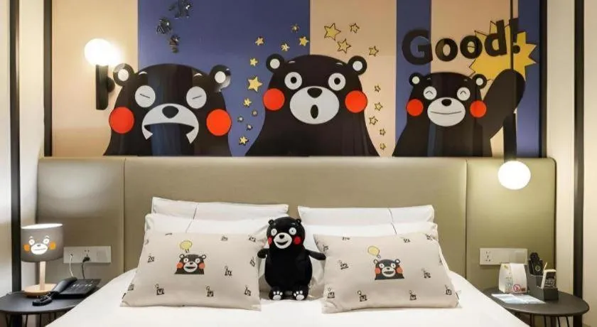 Bed in Magnotel Hotel Shanghai Jinjiang Park Branch