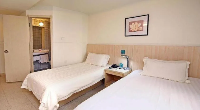 Bed in Jinjiang Inn Shanghai Tongji University