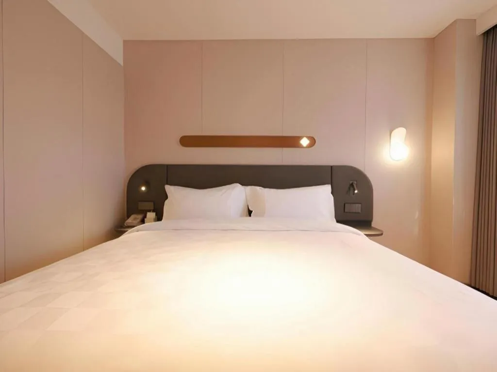 Bed in Jinjiang Inn Beijing Capital International Airport New Expo Metro Station