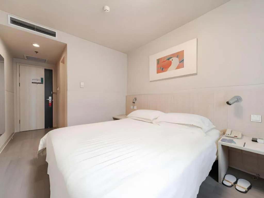 Bed in Jinjiang Inn Beijing Capital International Airport New Expo Metro Station