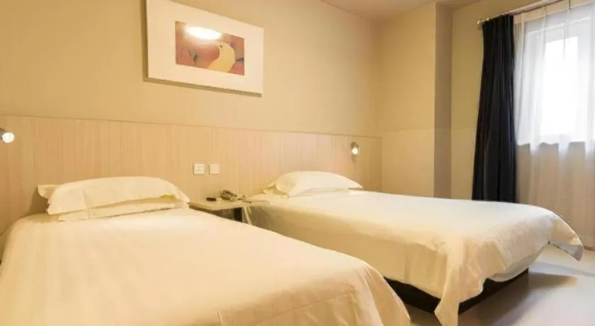 Bed in Jinjiang Inn Beijing Capital International Airport New Expo Metro Station