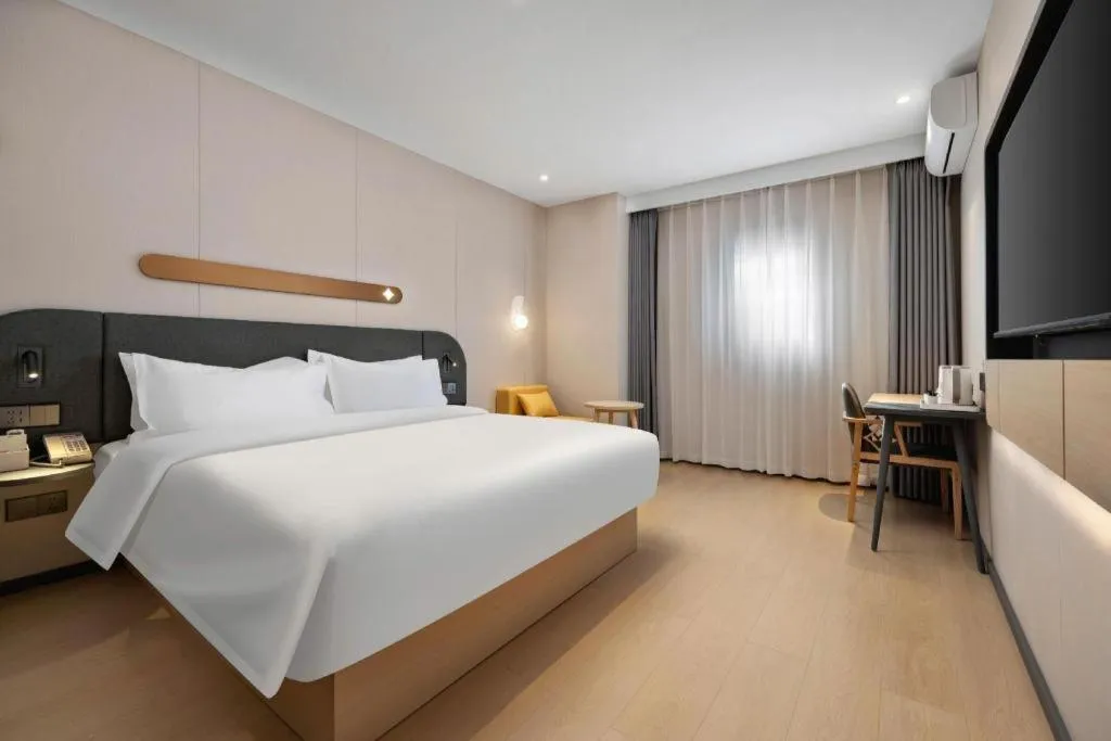 Bed in Jinjiang Inn Beijing Capital International Airport New Expo Metro Station