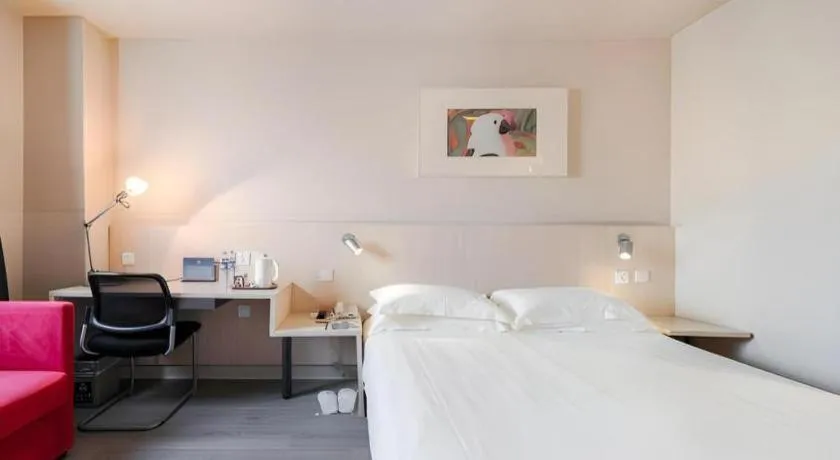 Bed in Jinjiang Inn Beijing Capital International Airport New Expo Metro Station
