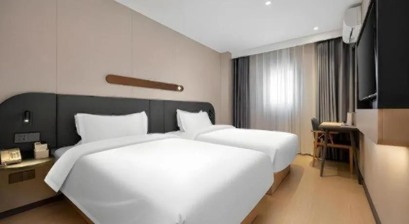 Bed in Jinjiang Inn Beijing Capital International Airport New Expo Metro Station