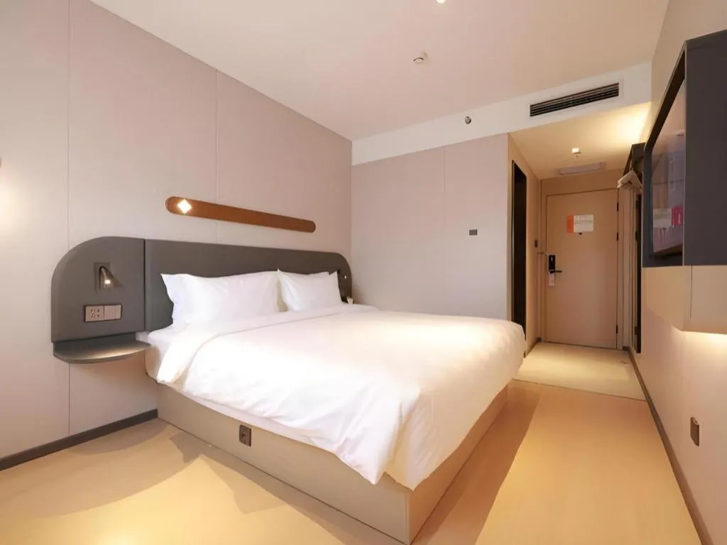 Bed in Jinjiang Inn Beijing Capital International Airport New Expo Metro Station