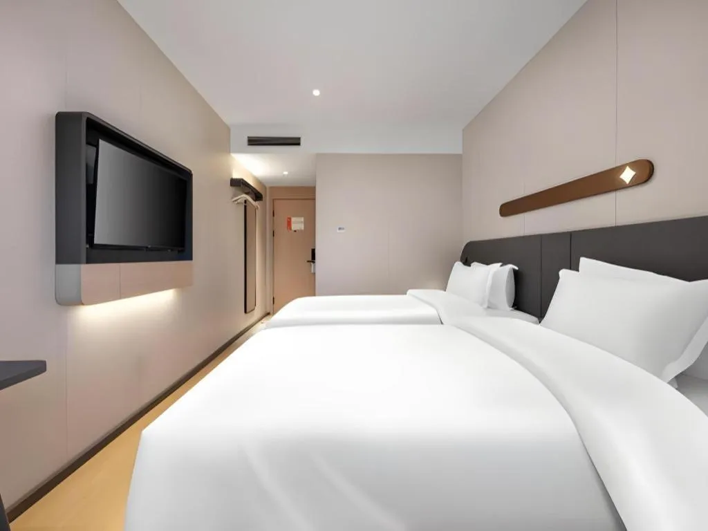 Bed in Jinjiang Inn Beijing Capital International Airport New Expo Metro Station