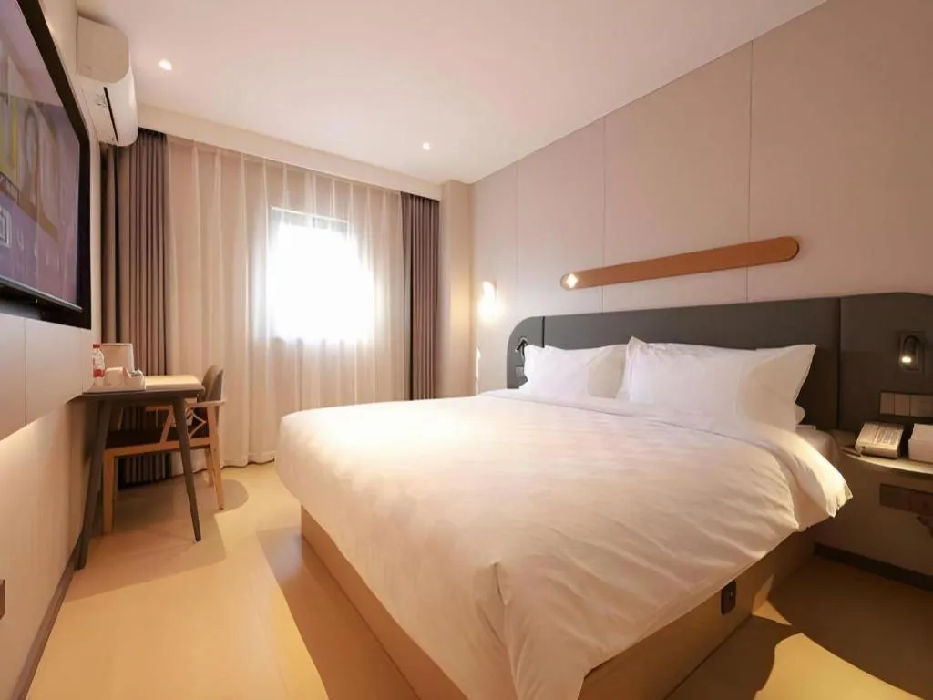 Bed in Jinjiang Inn Beijing Capital International Airport New Expo Metro Station