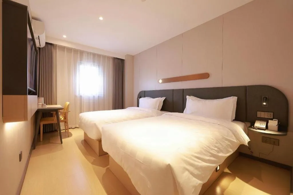 Bed in Jinjiang Inn Beijing Capital International Airport New Expo Metro Station