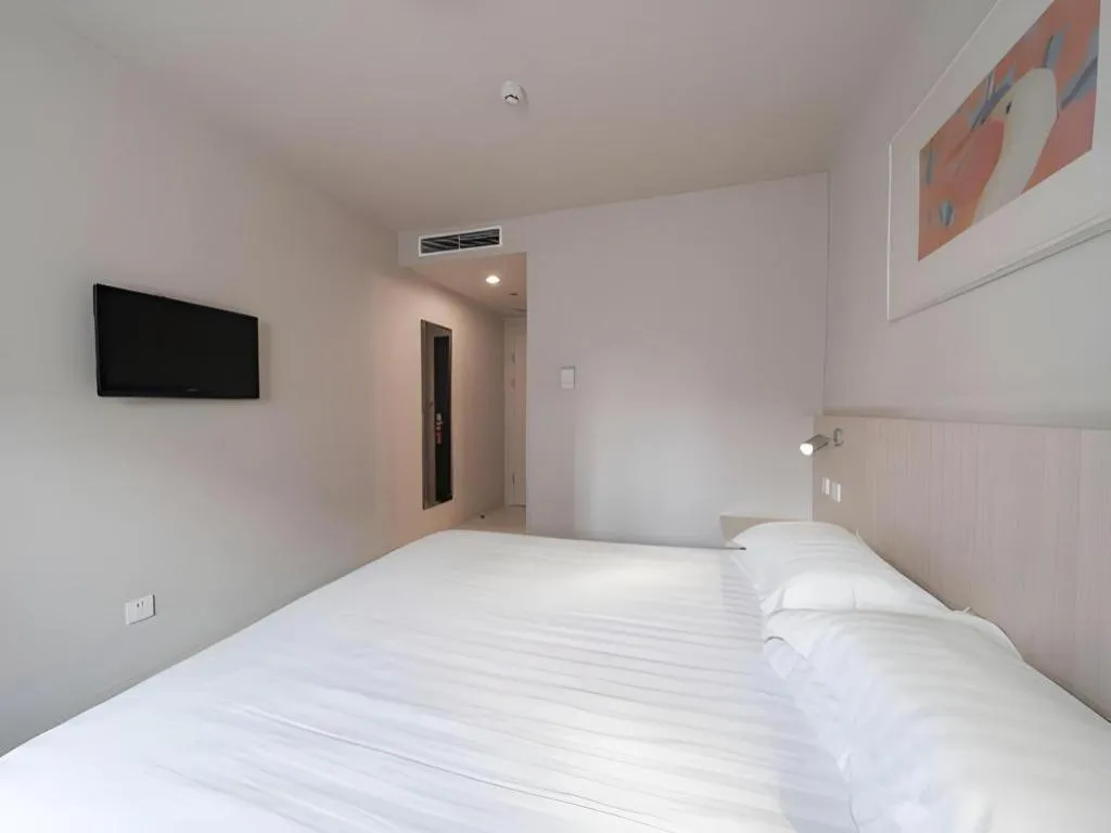 Bed in Jinjiang Inn Beijing Capital International Airport New Expo Metro Station