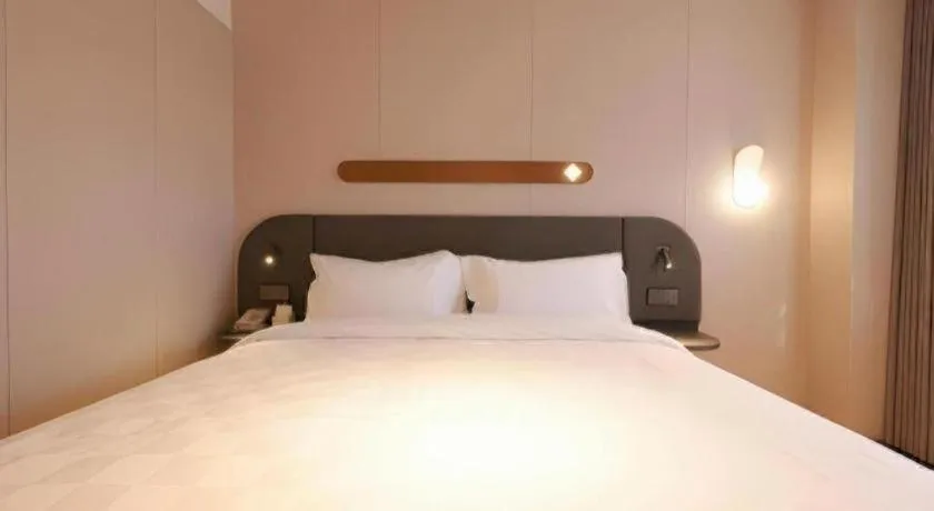 Bed in Jinjiang Inn Beijing Capital International Airport New Expo Metro Station