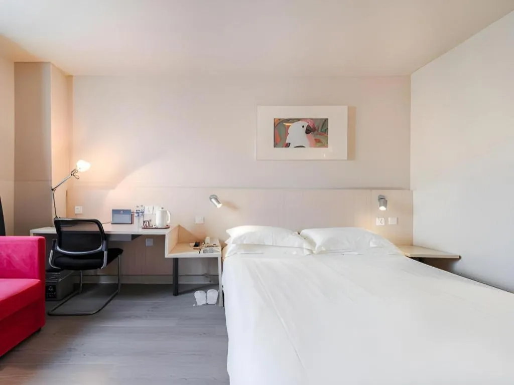 Bed in Jinjiang Inn Beijing Capital International Airport New Expo Metro Station