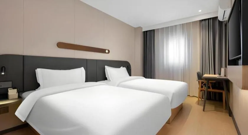 Bed in Jinjiang Inn Beijing Capital International Airport New Expo Metro Station