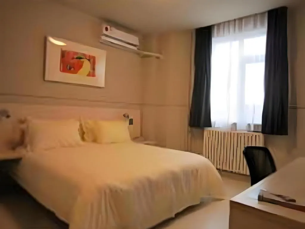 Bed in Jinjiang Inn Beijing Capital International Airport New Expo Metro Station