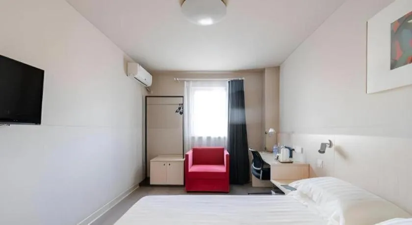 Bed in Jinjiang Inn Beijing Capital International Airport New Expo Metro Station