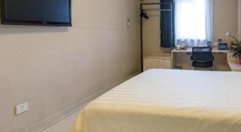 Bed in Jinjiang Inn Beijing Capital International Airport New Expo Metro Station