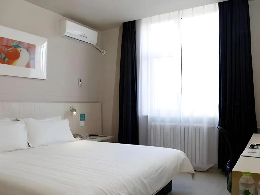 Bed in Jinjiang Inn Beijing Capital International Airport New Expo Metro Station