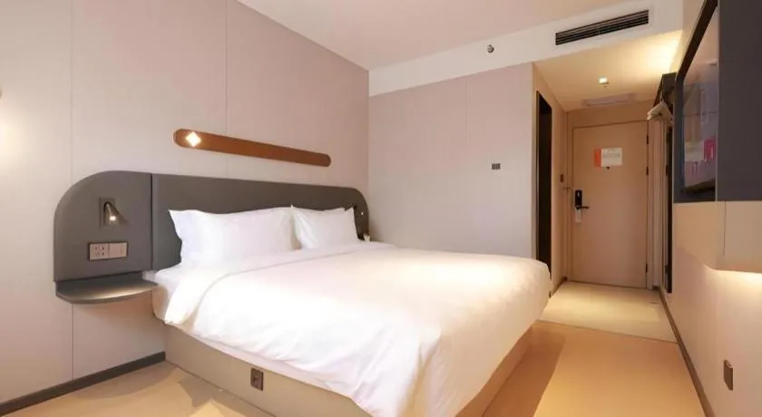 Bed in Jinjiang Inn Beijing Capital International Airport New Expo Metro Station