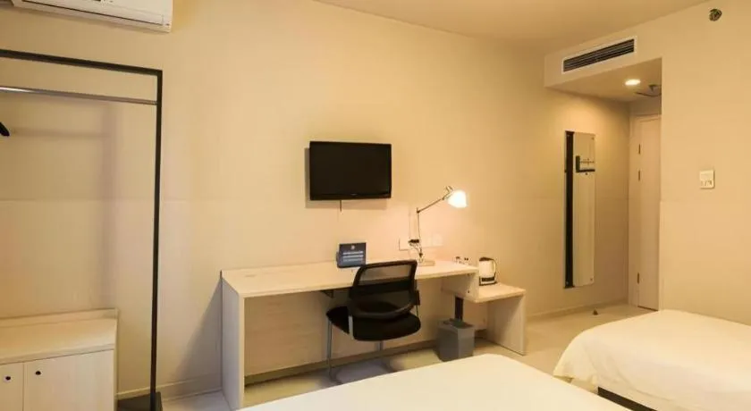 Bed in Jinjiang Inn Beijing Capital International Airport New Expo Metro Station