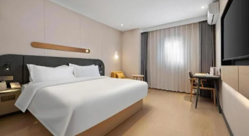 Bed in Jinjiang Inn Beijing Capital International Airport New Expo Metro Station