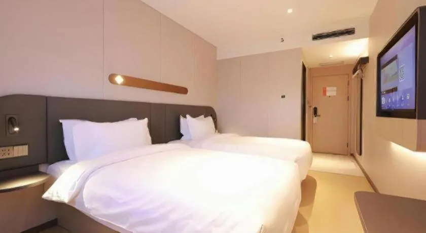 Bed in Jinjiang Inn Beijing Capital International Airport New Expo Metro Station