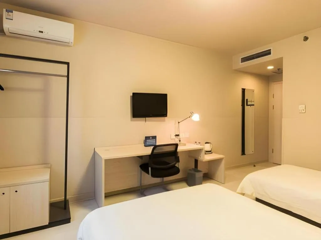 Bed in Jinjiang Inn Beijing Capital International Airport New Expo Metro Station