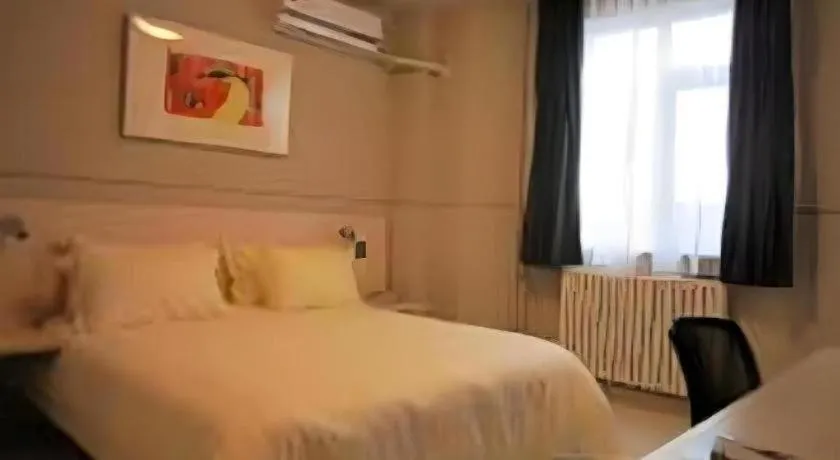 Bed in Jinjiang Inn Beijing Capital International Airport New Expo Metro Station