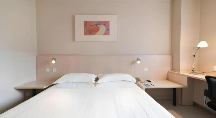 Bed in Jinjiang Inn Beijing Capital International Airport New Expo Metro Station