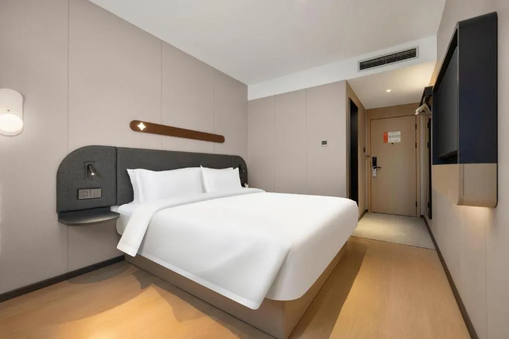 Bed in Jinjiang Inn Beijing Capital International Airport New Expo Metro Station